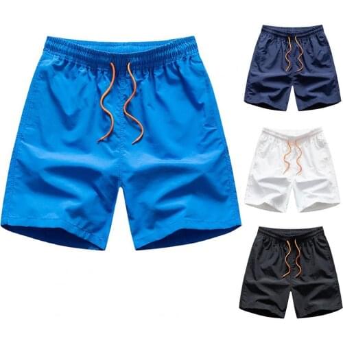 Male Casual Shorts Comfortable Solid Color Men Shorts Knee Length Soft Wide Leg Pockets Board Shorts Pants Bodybuilding Shorts