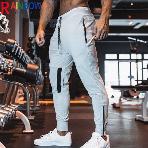 Rainbowtouches New Muscle Mens Fitness Sweaterpants Slim Zip Pocket Breathable Leggings Sport Pants Superior Quality