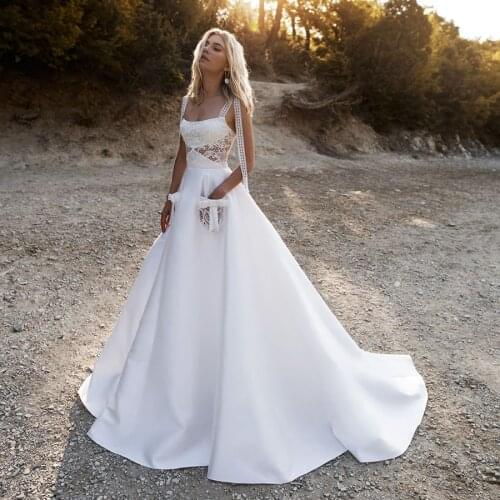 Lace Spaghetti Straps See Through Cutout Ball Gown Matte Satin Wedding Dress with Lace Pocket Bohemian Bridal Dresses