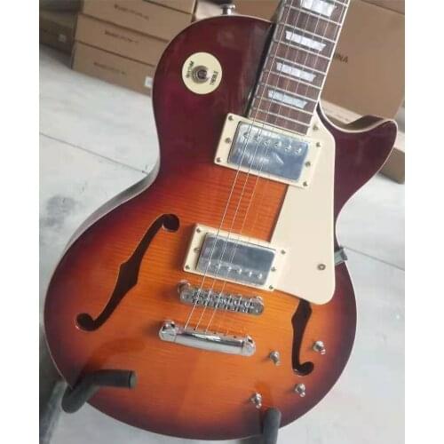 Guitarra Eléctrica alta calidad , instrumento musical de madera de arce flameado, F hole，Silver hardware，exhibición de fotos rea