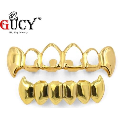 GUCY Gold Color Plated Hip Hop Teeth Grill Hollow Fang Top & Solid Fangs Bottom Grillz Set Vampire Grills Caps Halloween Gift