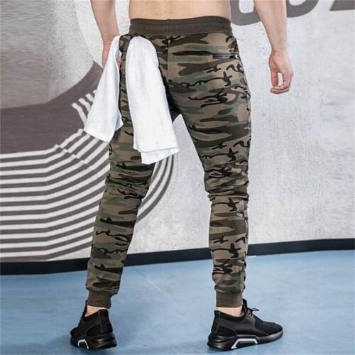Mens Motion pants Gym Fitness Casual Long Pants Men Fashion Workout Skinny Sweatpants Jogger Zip pocket Cotton Trousers Brand