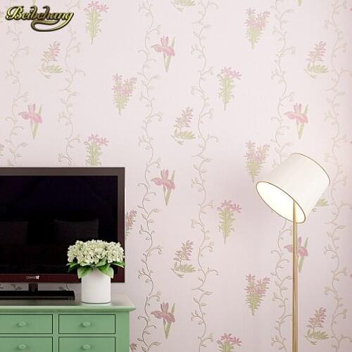 Beibehang Pressure three-dimensional non-woven wallpaper warm pastoral flowers bedroom living room full of sofa background