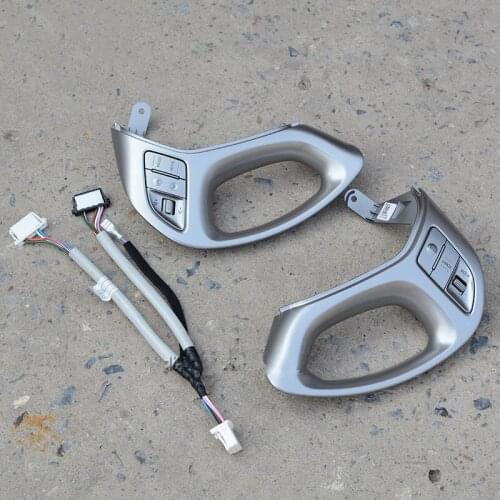 Original and genuine steering wheel multifunction music button cruise speed switch button is For modern ix35 Tucson 2010-2015
