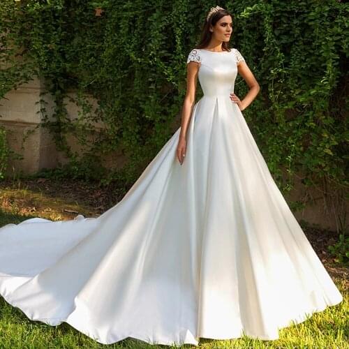 Muslim Wedding Dresses Ball Gown Cap Sleeves Satin Appliques Lace Puffy Dubai Arabic Wedding Gown Bridal Dress Vestido De Noiva