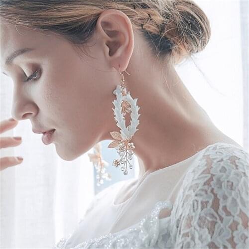 Ceramic flower metal leaf earrings, millet bead earrings, flower-shaped pearl 2021 fashion earrings, free shipping