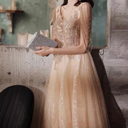 Champagne Gold Prom Dresses With Tassel Sleeves Sexy V-neck Illusion A-line Shiny Sequined Applique Tulle Formal Star Party Gown