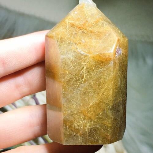 Golden rutilated tower