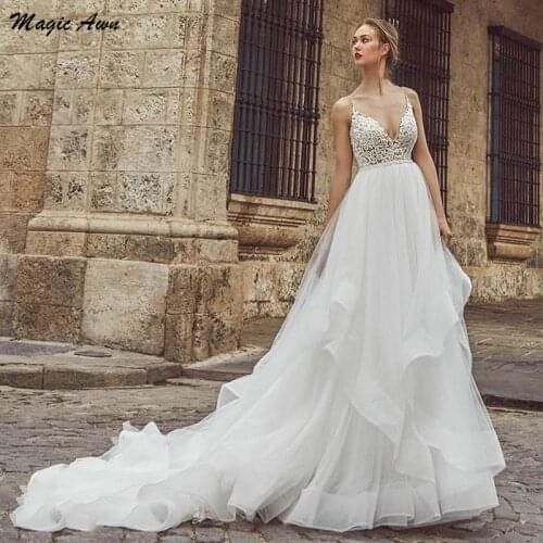 Magic Awn New Lace Appliques Boho Wedding Dresses Spaghetti Straps Open Back V-Neck Beach A-Line Bridal Gowns Robe De Mariee