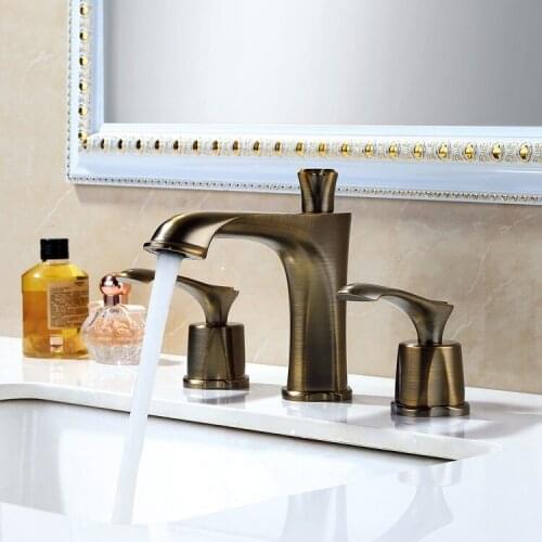 Antique bronze brass Bathroom sink faucet two handle three holes cold hot basin faucet Art design high quality faucet