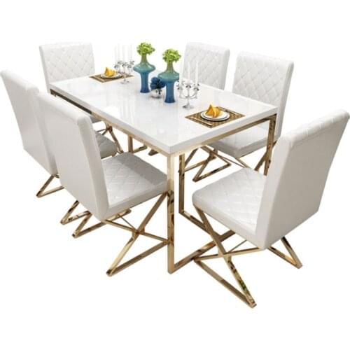 Stainless steel creative dining table and chair set modern minimalist nordic piano glass model room light luxury dining table