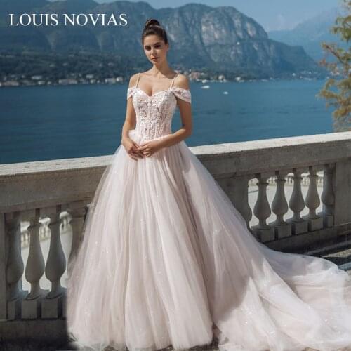 Sexy Open Back Spaghetti Shoulder Strap Princess Wedding Dress Sleeve Beading Sweetheart Brush Tail Sequin Dress