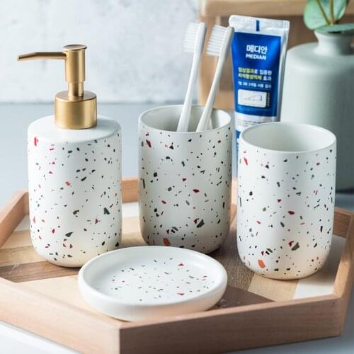 Ceramic Bathroom 4/Piece of Household/Lotion Bottle/Soap Dish/Mouth Cup/Toothbrush Holder/Home Decoration Desktop Decoration