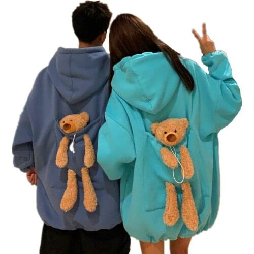 Richkeda Store New 2021 Autumn Hoodies Women Thicken Plus Velvet Bear Toy In Back Big Pocket Warm Soft Hooded Sweatshirt Couple