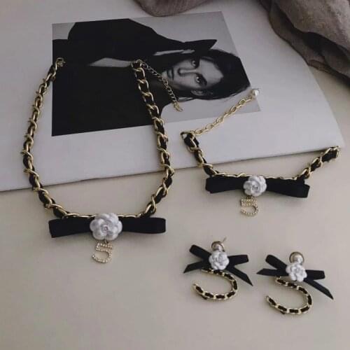 High quality camellia pearl worn leather bow double necklace black ribbon woven gold chain number 5 large circle necklace