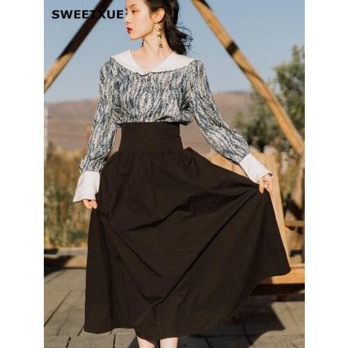 SWEETXUE Womens Retro Doll Collar Floral Shirt + Black Cross Strap Skirt Elegant And Chic Two-Piece Suit Lady