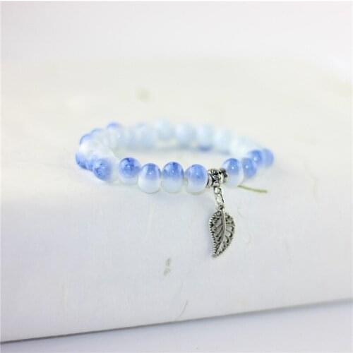 Hollow Leaf Ceramic Strand Bracelet For Women Men Frozen Fish Eye Beads Charm Beads Bangles Bohemian Jewelry Chain Wristbands