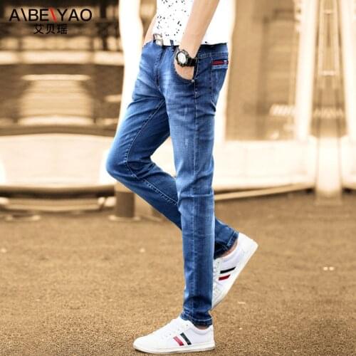 New 2021 summer thin students denim jeans mens slim Korean small feet black autumn student casual teenagers pencil pants