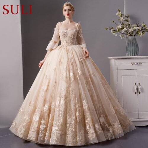 SL-1830 Top quality luxury long train wedding dress champagne color with beading 2019