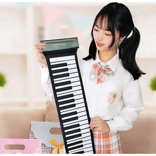 A portable foldable hand roll piano can connected to speaker roll up piano waterproof for sell