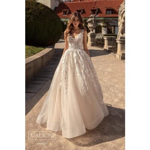 Ivory 2021 A Line Wedding Dresses Lace Appliqued Bridal Gowns V Neck Court Train Tulle Backless Vestidos De Novia