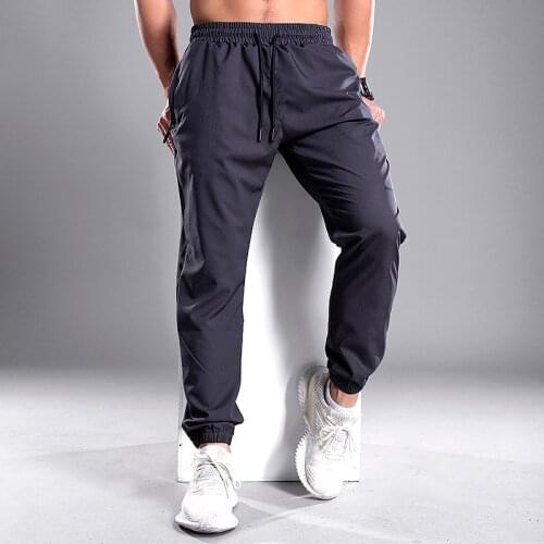 Men Jogging Pants GYM Training Pants Sportswear Sports Pants Mens Running Swearing Jogging Sport Pants With Zipper Pockets