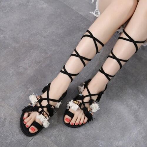 Pearl tassel sandals female 2021 new ethnic style cross strap flat bottom seaside vacation leisure beach Roman female sandals