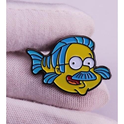 Old man fish pin badge