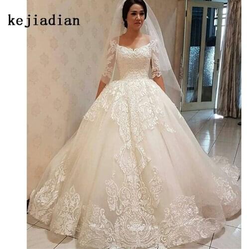 2020 Vintage Vestidos De Novias V Neck Appliqued Lace Pearls Half Sleeve Ball Gown Wedding Dress White Ivory Bridal Gown