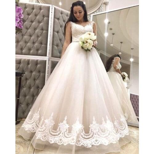 2021 Sexy New Sheer Neck A Line Wedding Dresses Illusion Tulle Lace Applique Top Floor Length Bridal Gowns With Beaded Sash