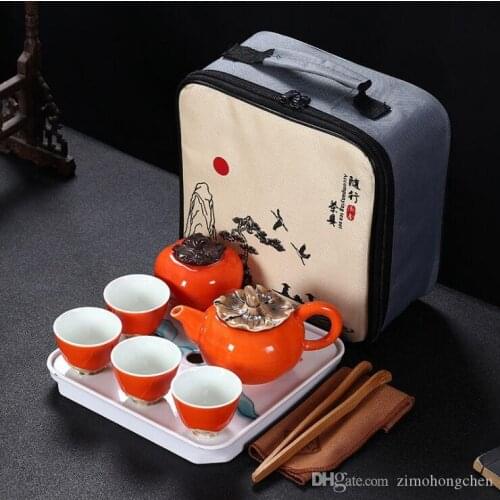 1 pot 4 cups portable travel ceramic tea set features customized tea sets A persimmon shaped tea tool Creative gifts