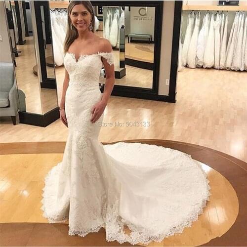 Full Lace Mermaid Wedding Dresses 2020 Sexy Sweetheart Cap Sleeves Open Back Sweep Train Appliques Bridal Gowns Champagne