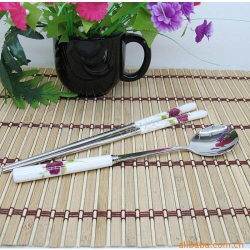Five yuan Shop New / Korean dishes / early spring rose bone handle stainless steel spoon loss clearance