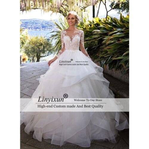 Vintage Ball Gown Wedding Dresses Princess 2021 Long Sleeve Open Back Appliques Lace Tulle Tiered Skirt Bridal Wedding Gowns