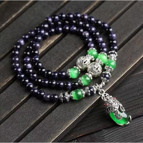 Exquisite fashionable starry sky blue sand and stone bracelet is matched with the green cat eye PI xiu pendant lovers bracelet