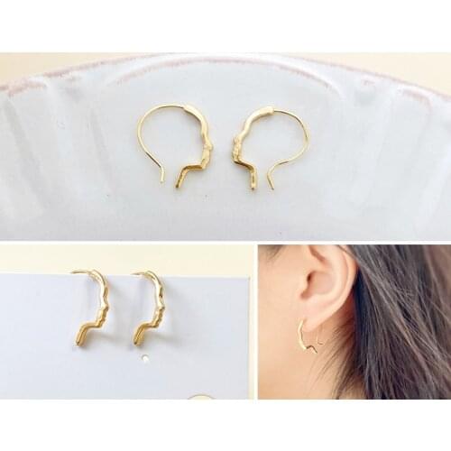 Gold-clad line drawing face earrings funny abstract simple pen outline face geometric lines wild shape earrings