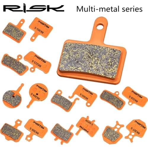 RISK 1Pair/2pcs MTB Mountain Bicycle Metal Brake Pad Cycling Red Copper Fiber for M445/355/395 Resin Organic Disc Road Brake Pad