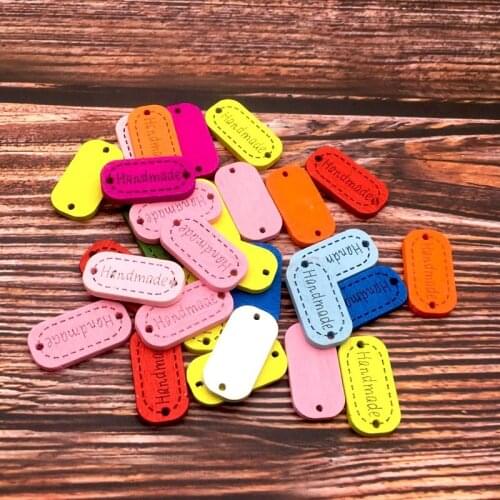 100PCS/Lot 12X24mm Wooden Button DIY "Hand Made" Tags Wood Sewing Accessories For Clothes Handmade Scrapbooking Craft SC075