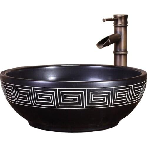 Artistic hand maded and crafted black ceramic porcelain wash basin