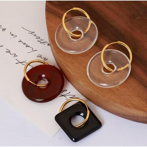 Europe and the United States simple trend personality hollow round resin material asymmetry fashion earrings