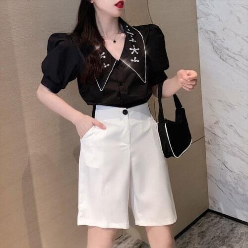 2021 Summer Female Hepburn Style Suit Black Embroidered Doll Collar V-neck Shirt + White Shorts Two-piece Suit