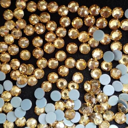 Wholesale hotfix rhinestone SS16 topaz color with 1440pcs each pack 4mm flat back,high levels cutting hotfix crystal