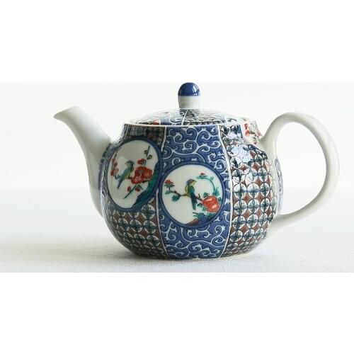 Imported from Japan pill grain painting of flowers and figure stainless steel sieve ceramic teapot tea for the cause