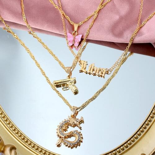 Flatfoosie 4 PCS/Set Boho Gold Color Multi layer Necklace Libra Pistol Dragon Butterfly Pendant Necklace Women Creative Jewelry