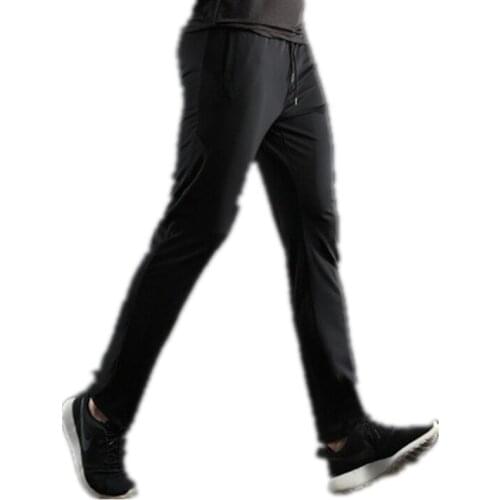 Spring Autumn Mens Casual Pants Slim Straight Pants Silky Black Light Edition Quick-drying Elastic Pants