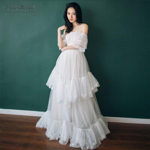 Strapless Tulle Wedding Dress Lace Edge Stunning Ruffles Floor Length Dreamy Vestido De Noiva Champagne Lining DW071