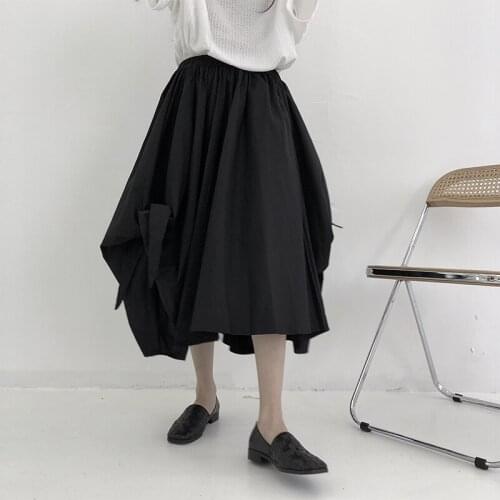 Large 2021 summer high waist design sense of minority skirt pleated black high sense medium length skirt