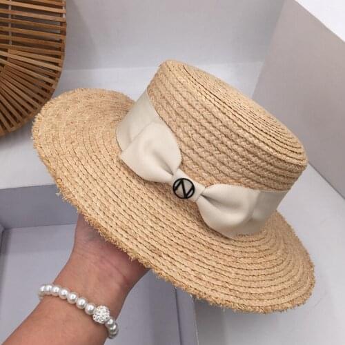 Spring and summer new lafite straw hat seaside beach resort sun hat for men and women fashion travel shopping bask in a