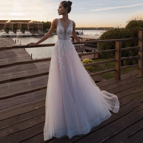 Low V-Neck Light Pink Princess Bridal Gowns Sleeveless Appliqued Bride A-Line Tulle Wedding Dress 2020 Vestido De Noiva