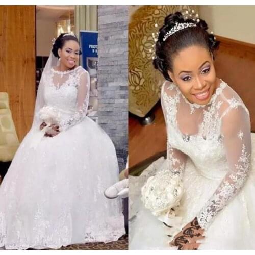 African Wedding Dresses Ball Gown Jewel Lace Applique Bridal Gowns With Long Sleeve Sweep Train Country Wedding Gowns